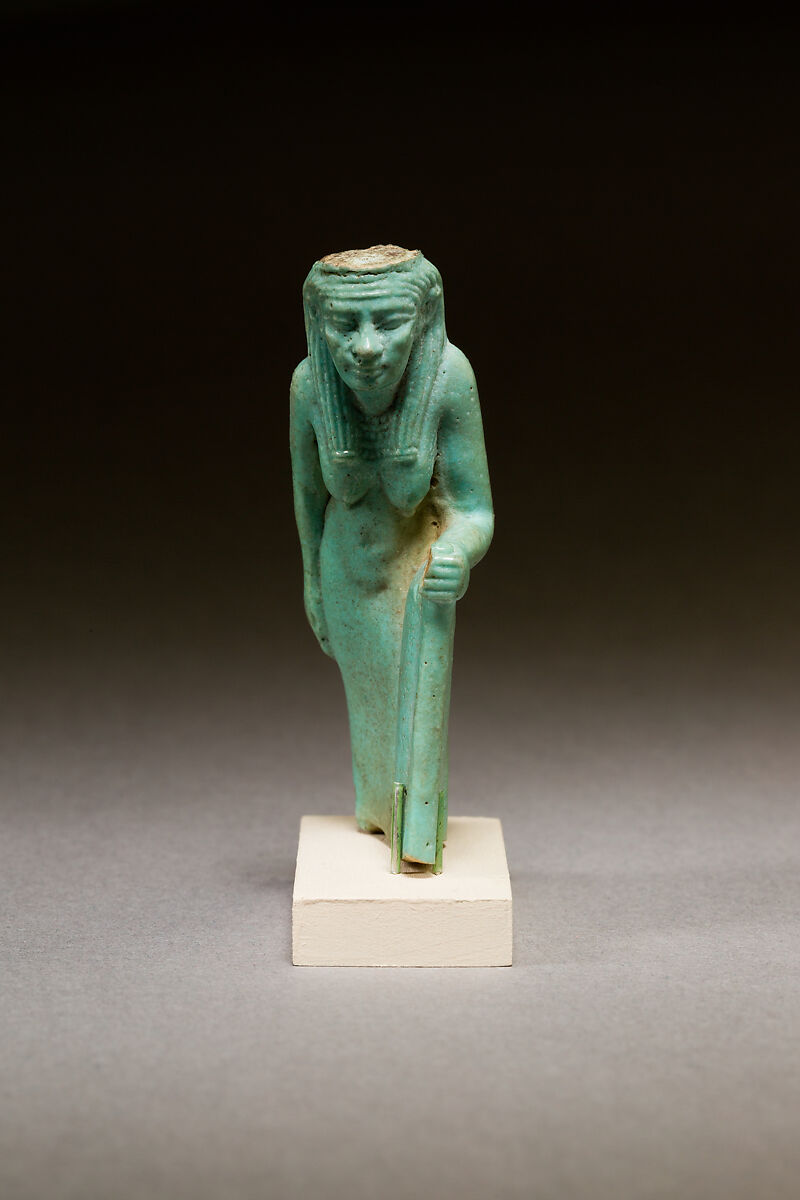 Statuette of a worn or aged woman, probably a goddess, Faience