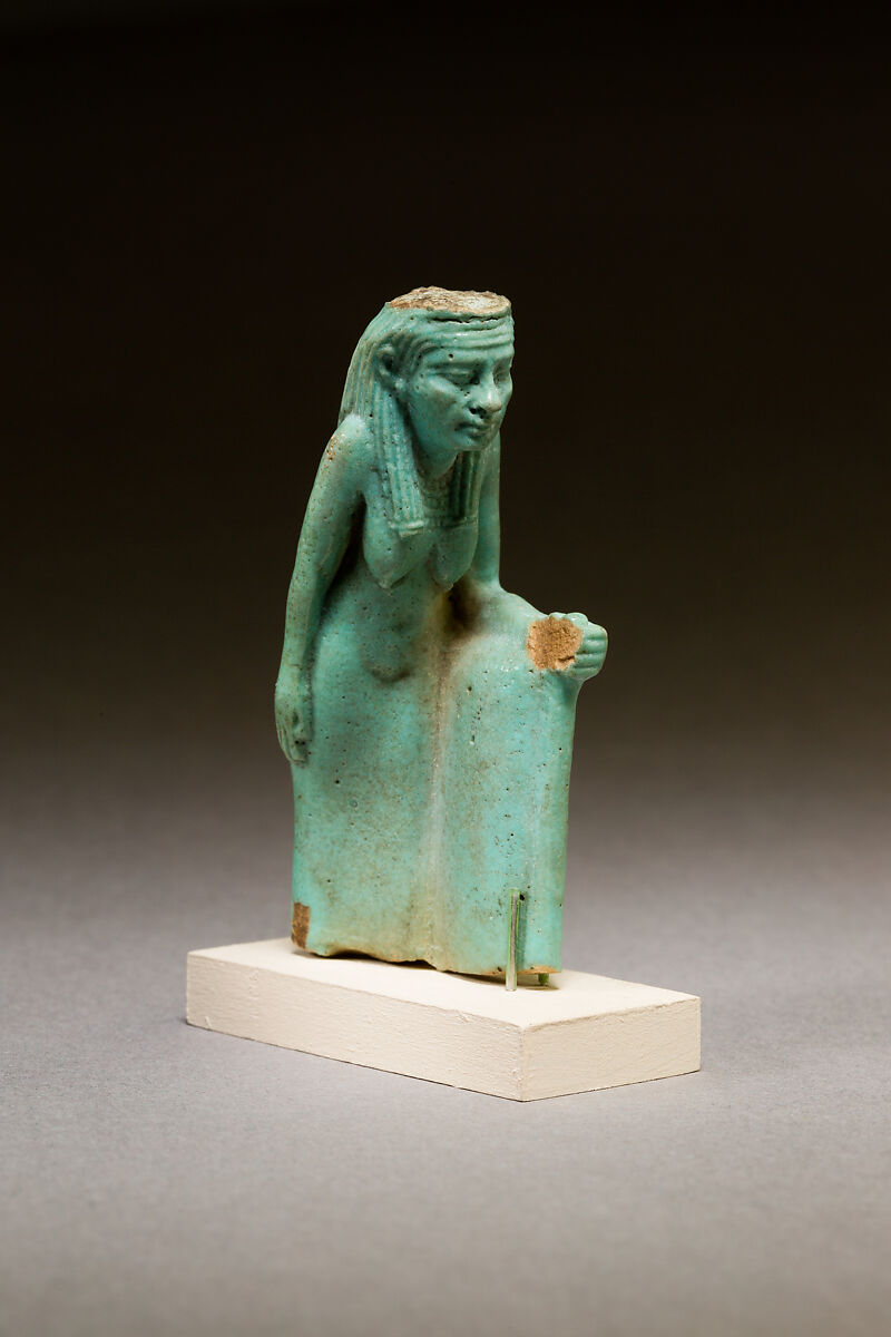 Statuette of a worn or aged woman, probably a goddess, Faience