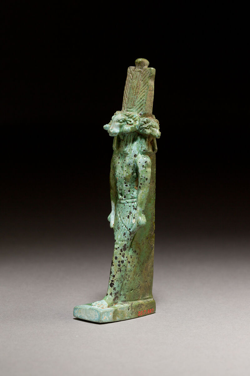 God with four ram heads facing in four directions, probably Khnum, Faience