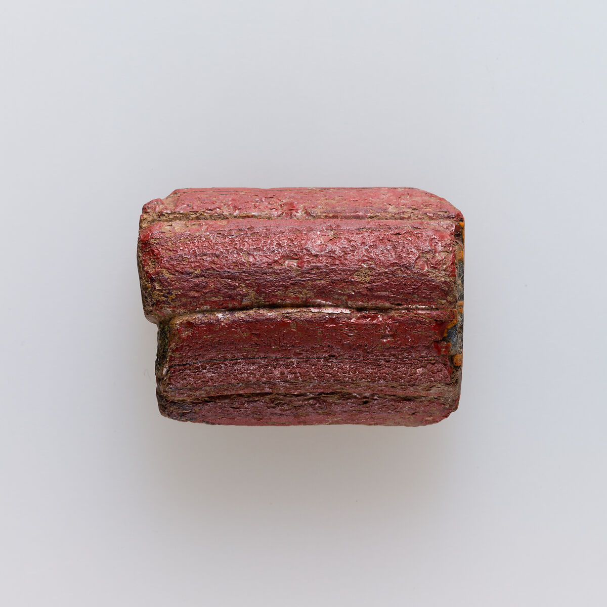 Drawn out cane with rosette design, Glass