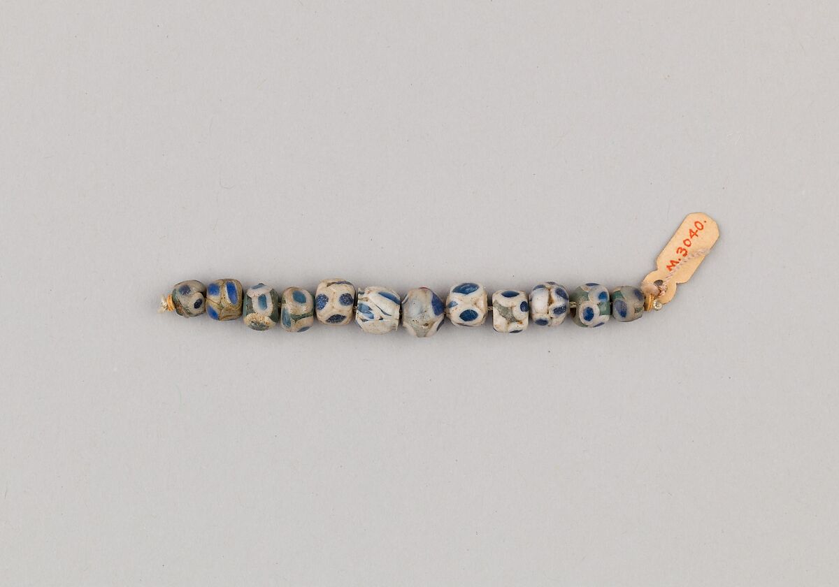String of 12 Eyed Beads, Glass 