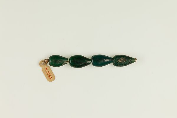 String of 4 pear-shaped beads