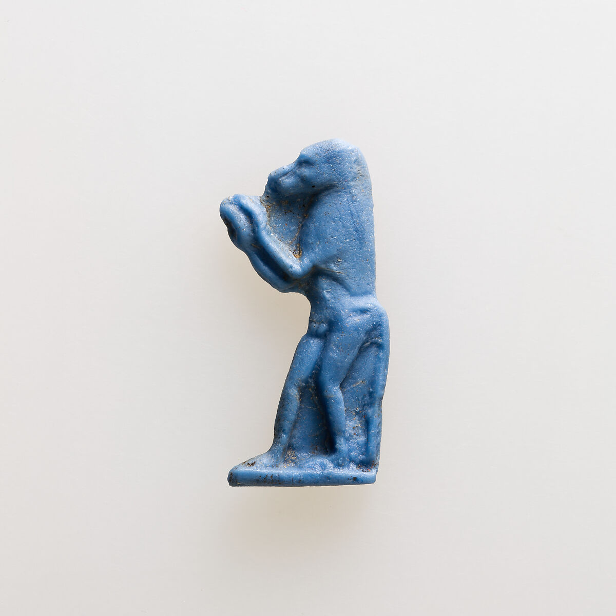 Amulet of baboon in act of adoration, Glass 