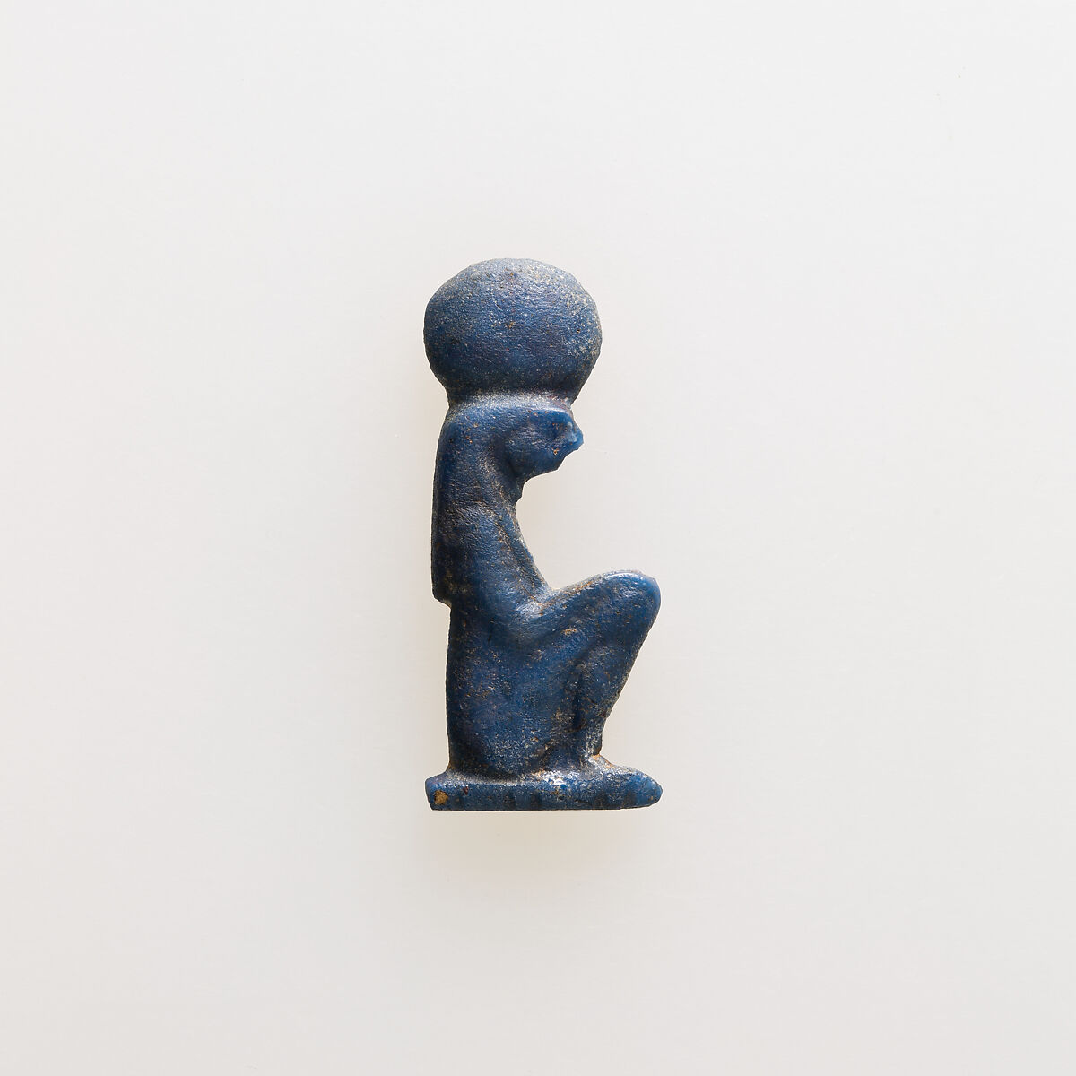 Amulet of Re-Harakhty squatting, Glass 