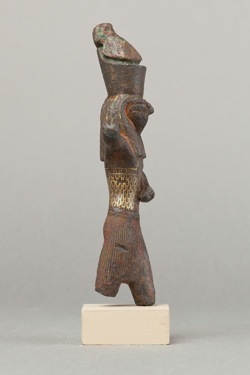 Horus slaying an antelope, spear and antelope (?) missing, Cupreous metal, precious metal inlay