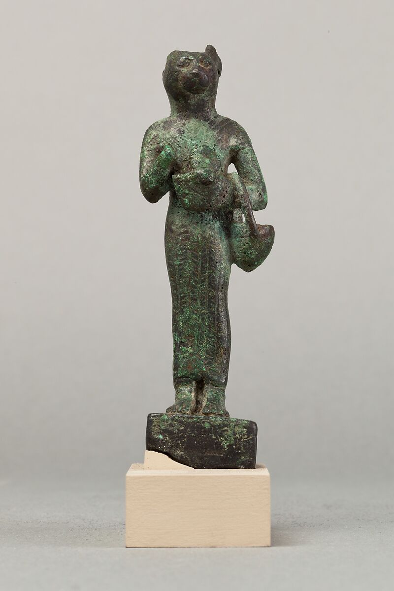 Bastet with lion-headed aegis and basket, Cupreous metal 