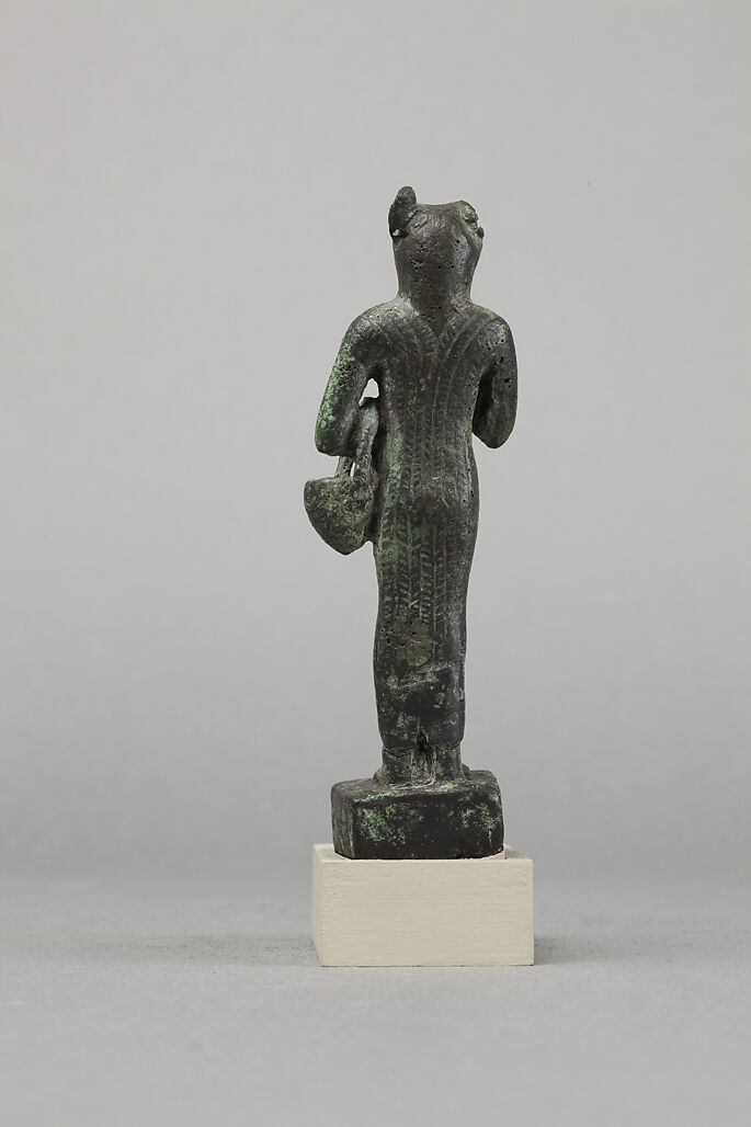 Bastet with lion-headed aegis and basket, Cupreous metal