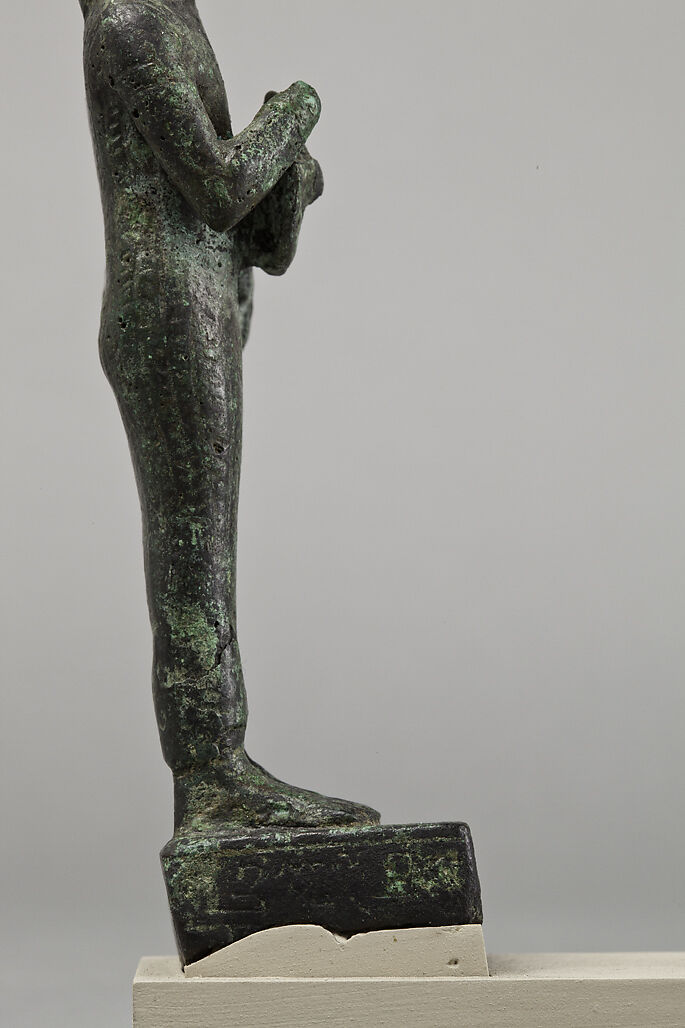 Bastet with lion-headed aegis and basket, Cupreous metal