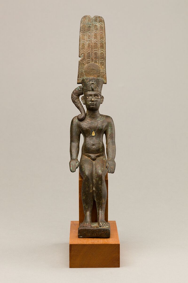 Child god with the Amonian crown named Horus of Mednit (Aphroditopolis), Cupreous metal, precious metal inlay 