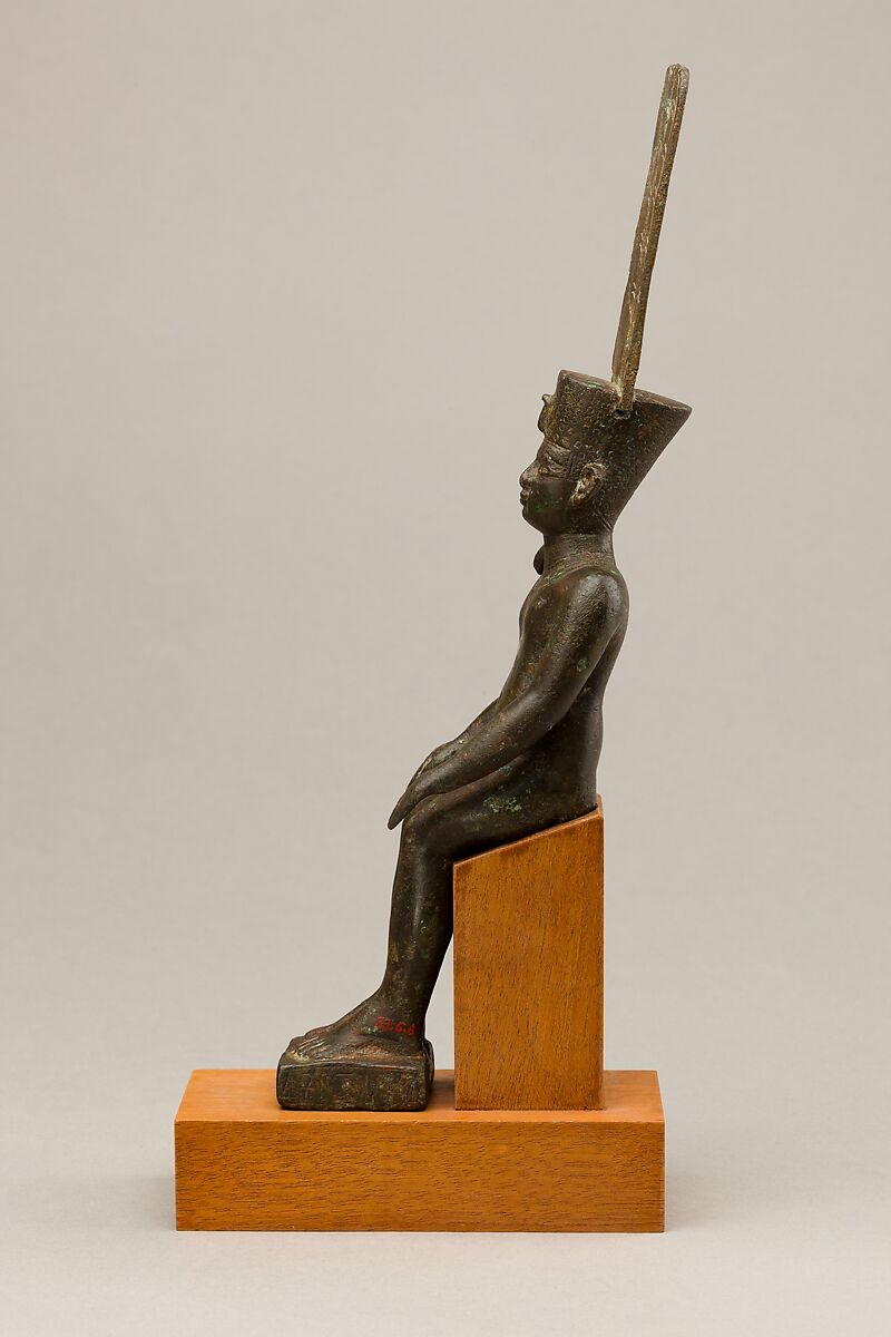 Child god with the Amonian crown named Horus of Mednit (Aphroditopolis), Cupreous metal, precious metal inlay