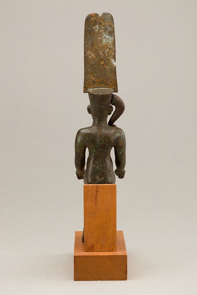 Child god with the Amonian crown named Horus of Mednit (Aphroditopolis), Cupreous metal, precious metal inlay