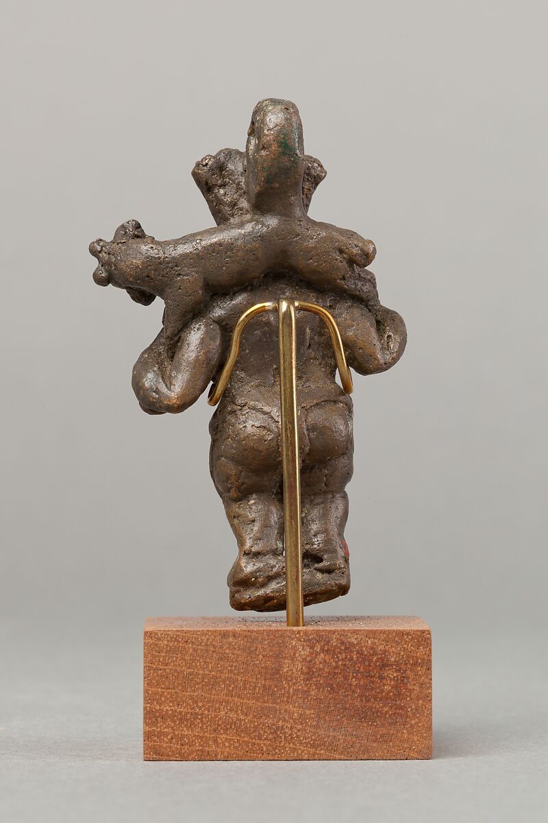 Bes carrying a ram over his shoulders, Cupreous metal