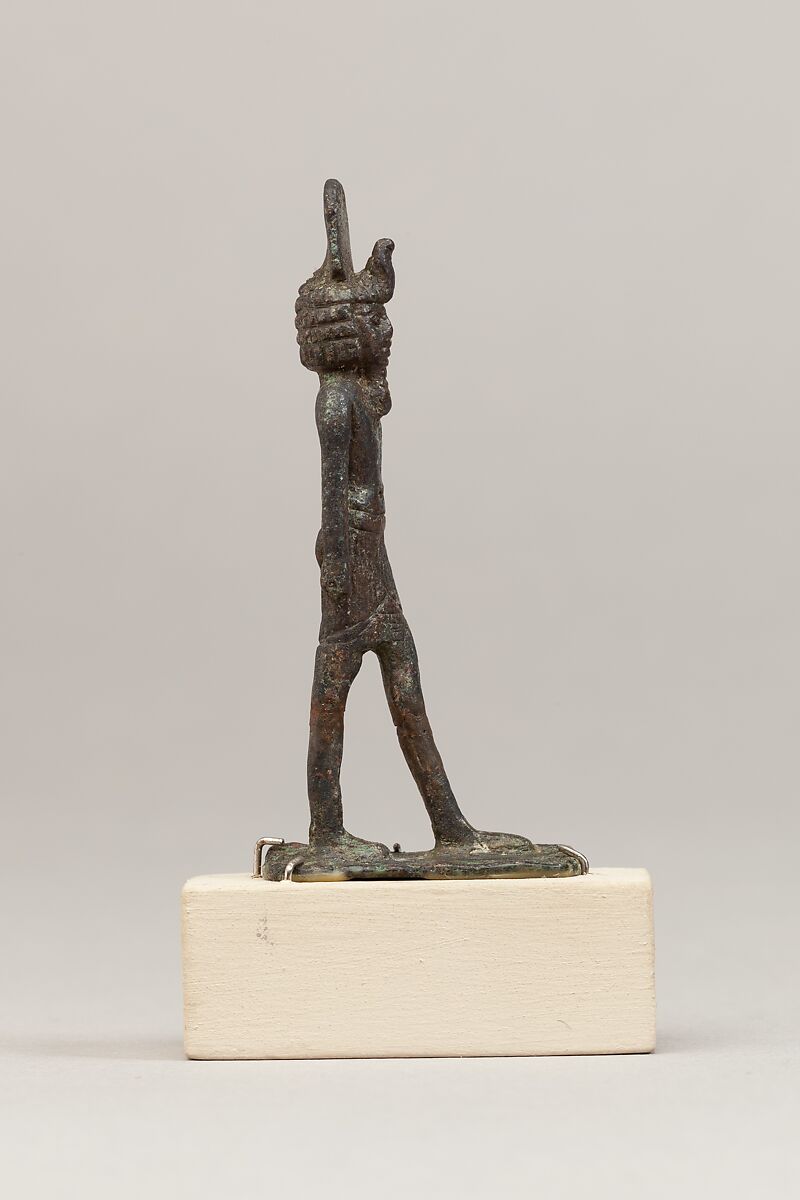 God wearing disk and uraeus on a short wig, Cupreous metal