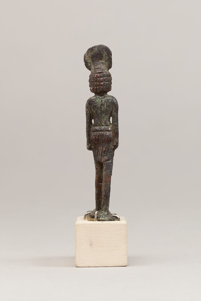 God wearing disk and uraeus on a short wig, Cupreous metal