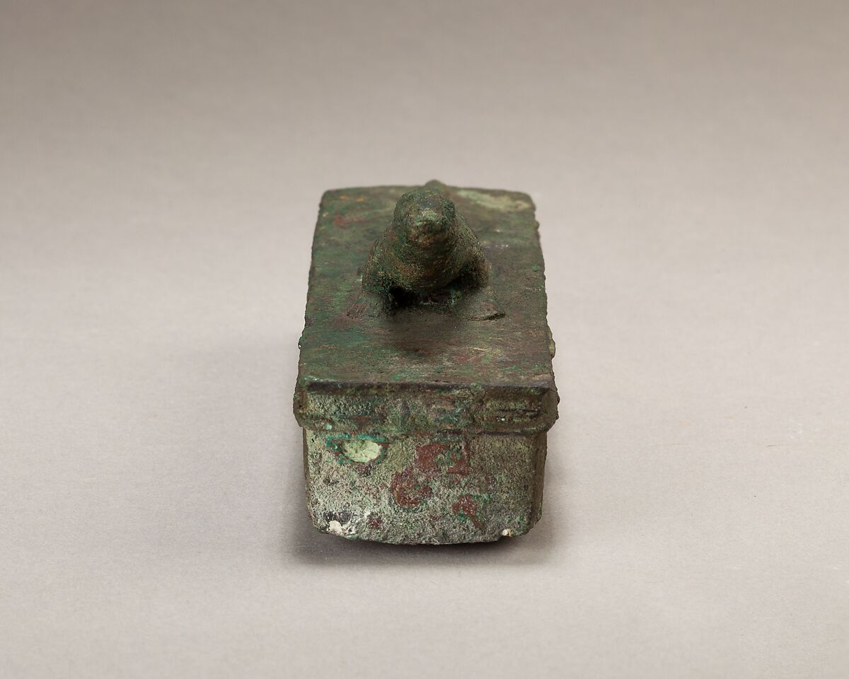 Shrine-shaped case for an animal mummy surmounted by a lizard, Cupreous metal