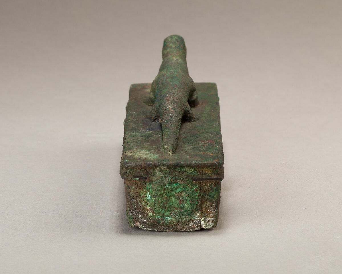 Shrine-shaped case for an animal mummy surmounted by a lizard, Cupreous metal
