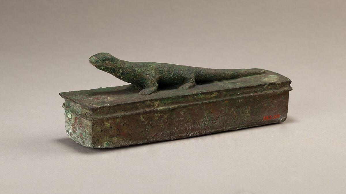 Shrine-shaped case for an animal mummy surmounted by a lizard, Cupreous metal 