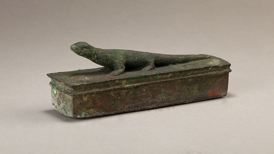 Shrine-shaped case for an animal mummy surmounted by a lizard