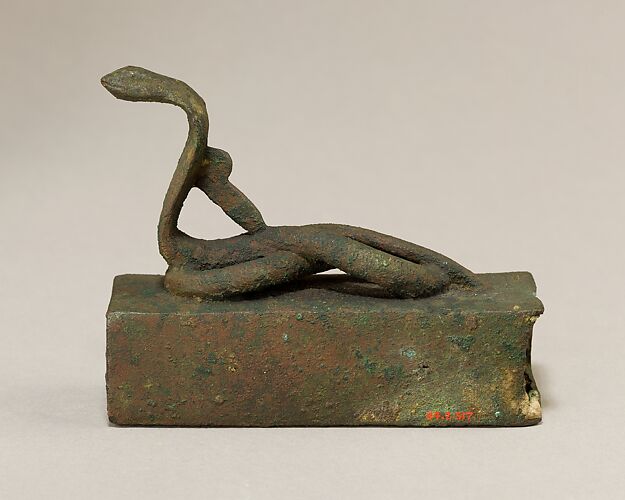 Box for an animal mummy surmounted by a coiled, rearing snake