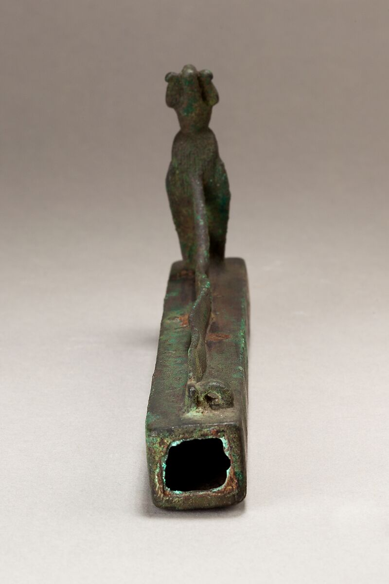Atum as a human-headed cobra surmounting a box for an animal mummy, Cupreous metal