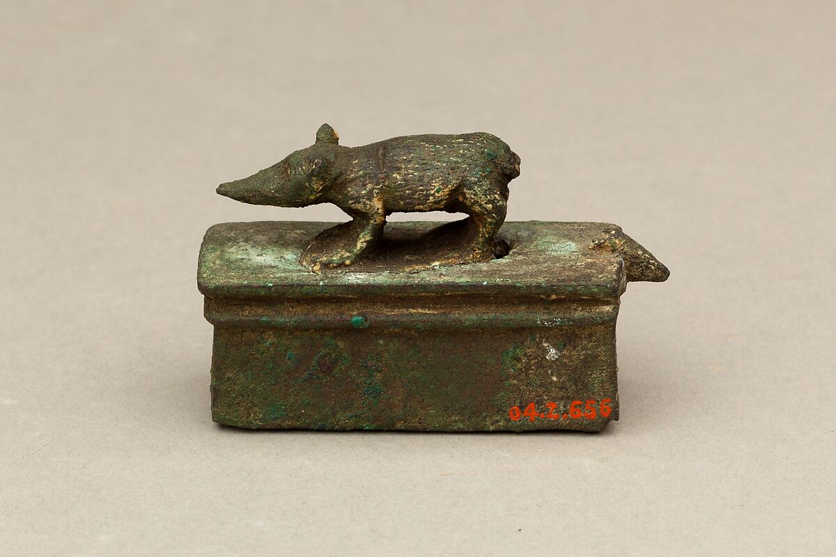 Shrew-mouse surmounting shrine-shaped box for an animal mummy, Cupreous metal 