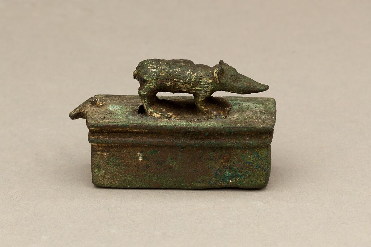 Shrew-mouse surmounting shrine-shaped box for an animal mummy, Cupreous metal