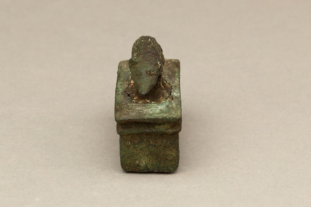 Shrew-mouse surmounting shrine-shaped box for an animal mummy, Cupreous metal