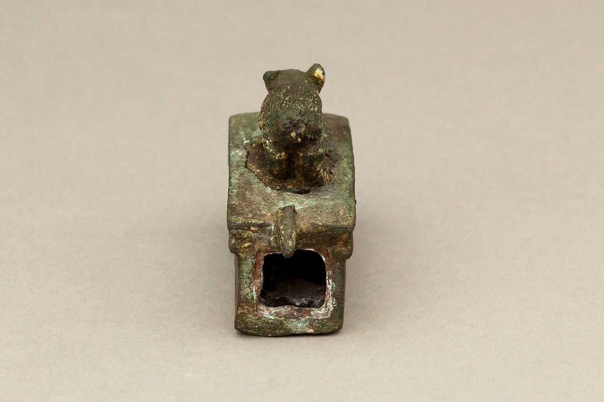 Shrew-mouse surmounting shrine-shaped box for an animal mummy, Cupreous metal