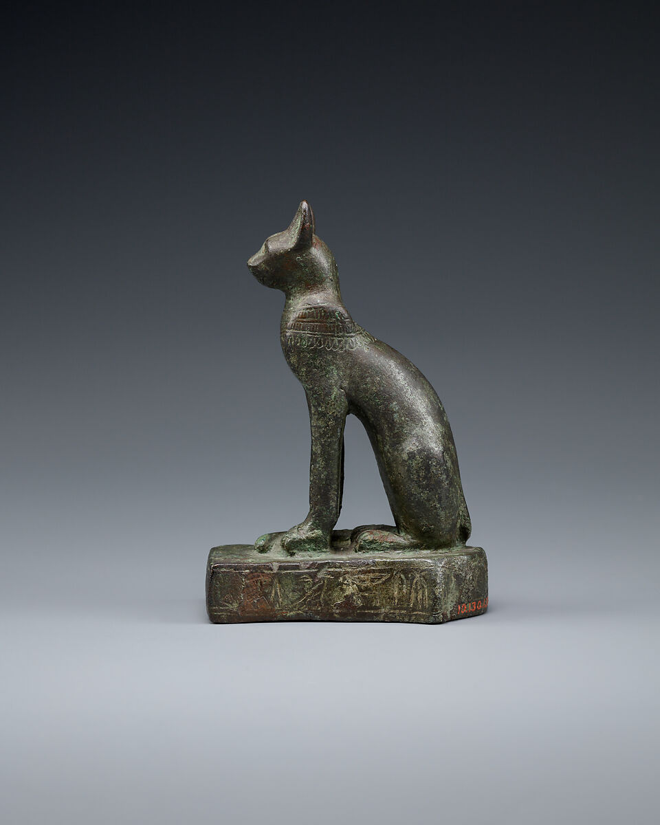 Cat with very worn inscription, Cupreous metal