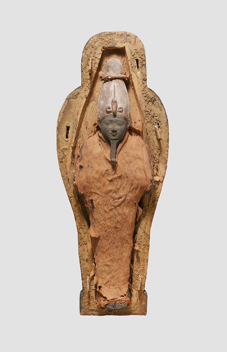 Falcon-headed coffin and grain mummy with Osiris mask, Coffin: Wood, paint; Mummy: Linen bandages; Mask: Wax