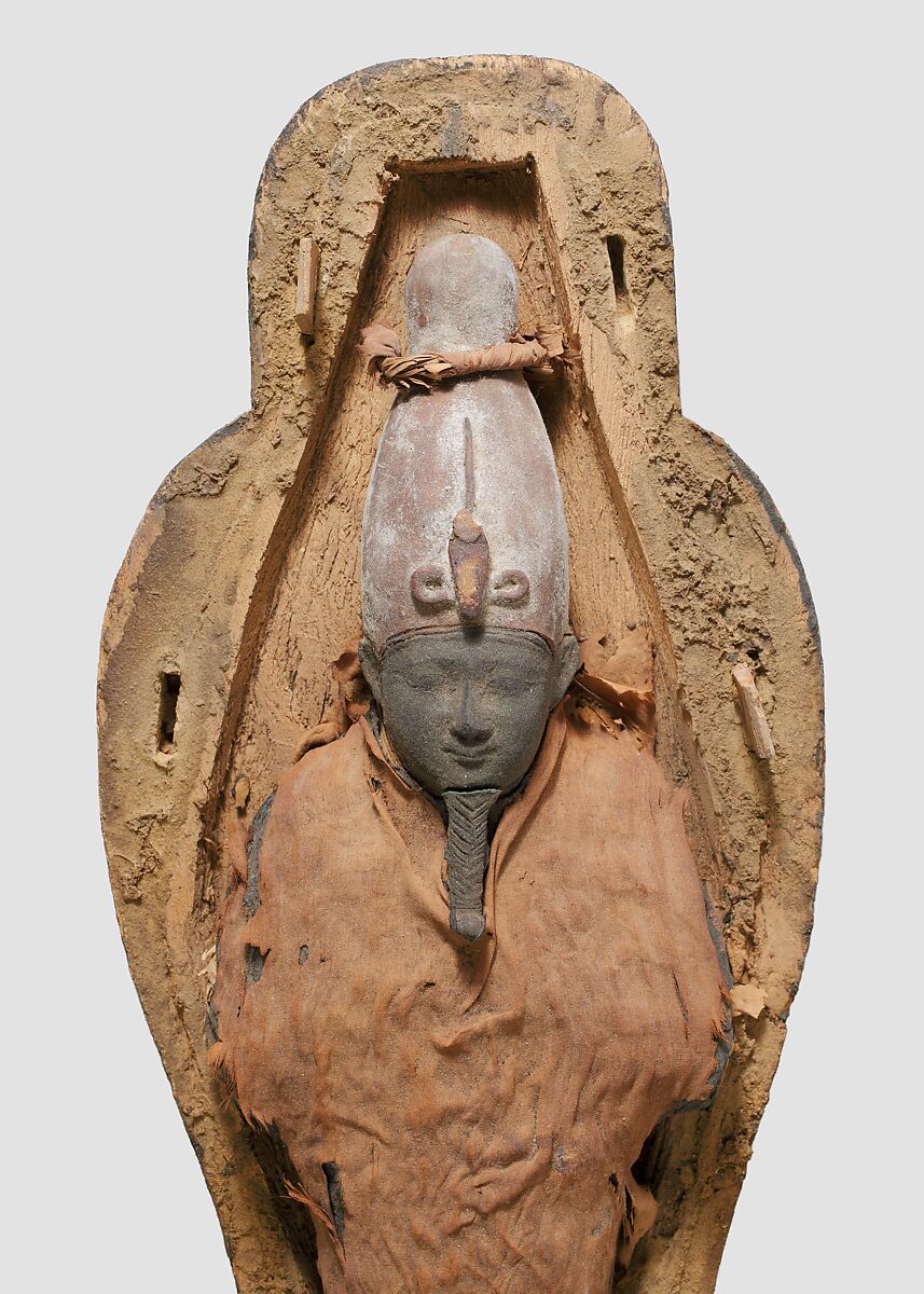 Falcon-headed coffin and grain mummy with Osiris mask, Coffin: Wood, paint; Mummy: Linen bandages; Mask: Wax