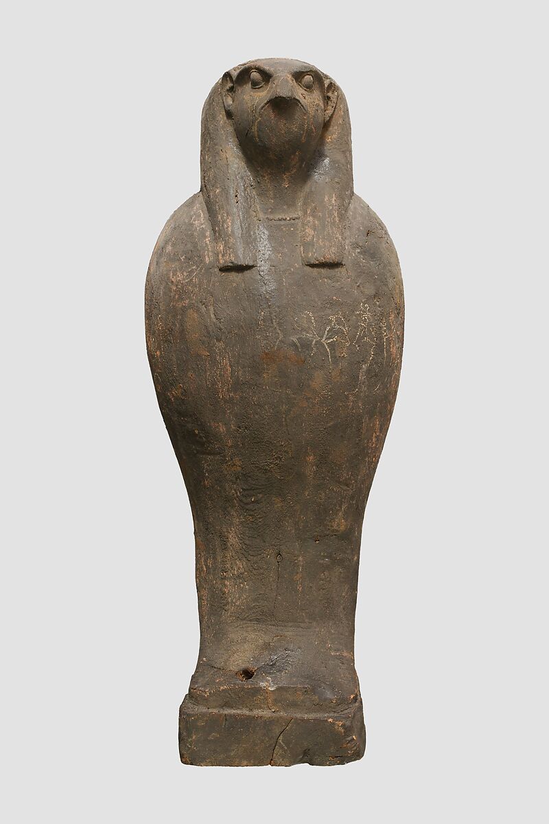 Coffin and Corn Mummy with Osiris mask, coffin: wood, paint; mummy: linen bandages; mask: wax 