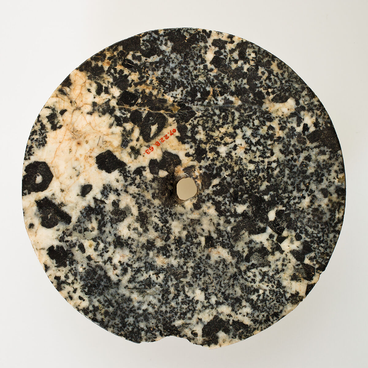 Disc-shaped mace head, Stone