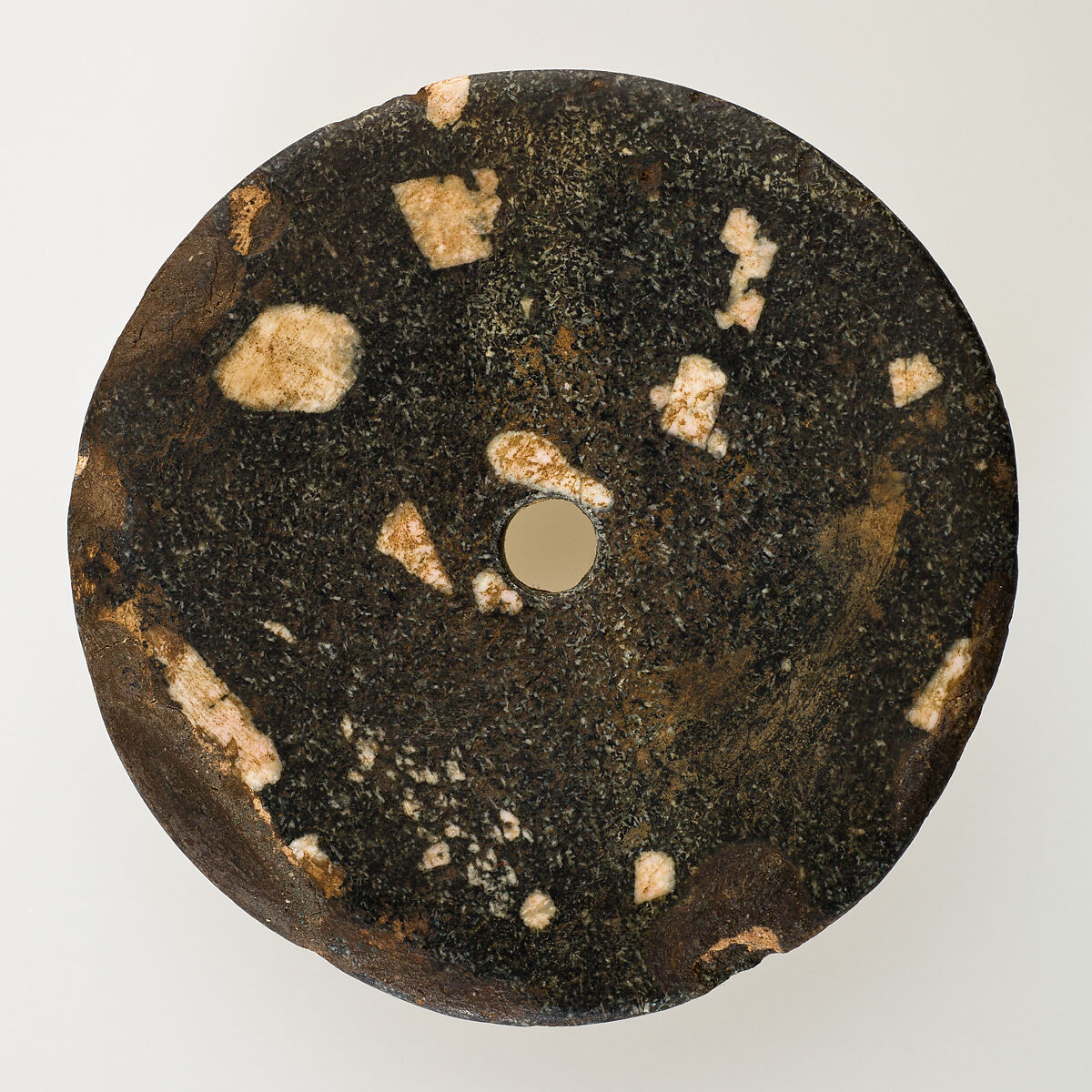 Disc-shaped mace head, Porphyry