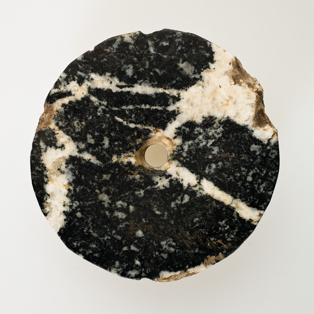 Disc-shaped mace head, Stone