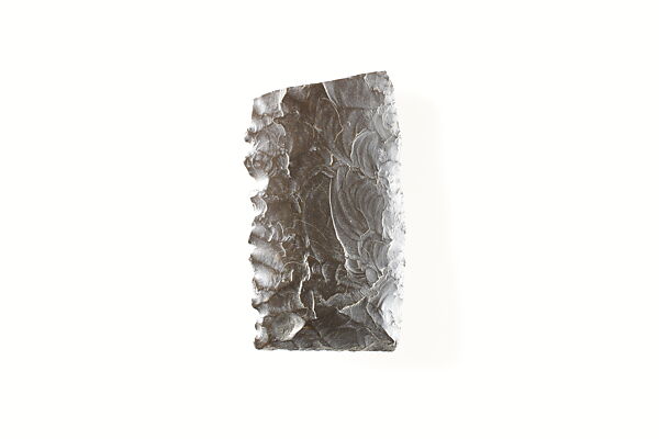 Fragment of a bifacial sickle insert, Flint