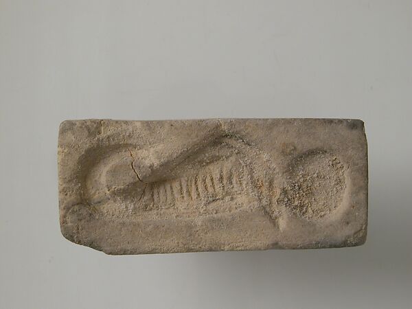 Stamp with uraeus and sun disk