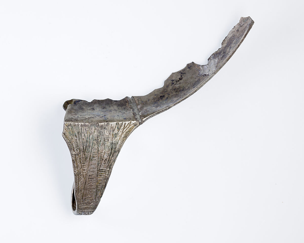 Rim fragment with handle from a shallow strainer, Silver