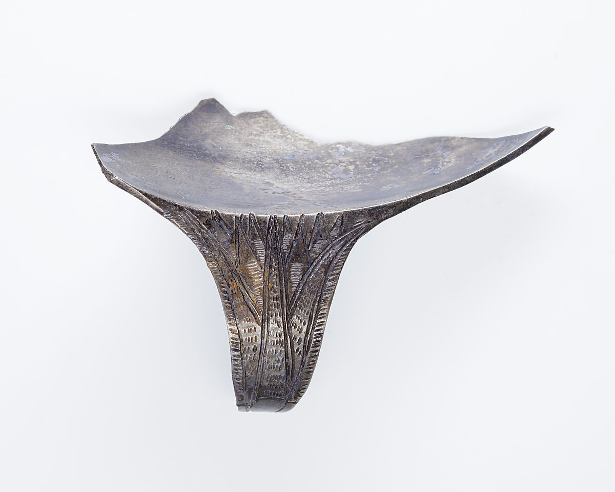 Rim fragment with handle from a shallow strainer, Silver 