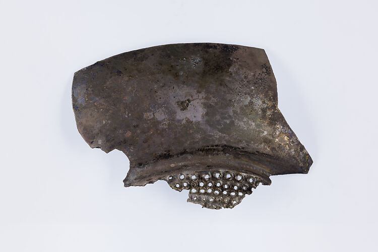 Fragment of a shallow strainer