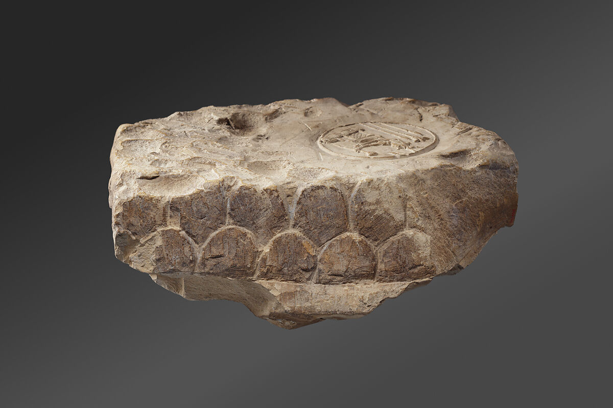 Possible trial piece depicting a lion-headed deity, Stone