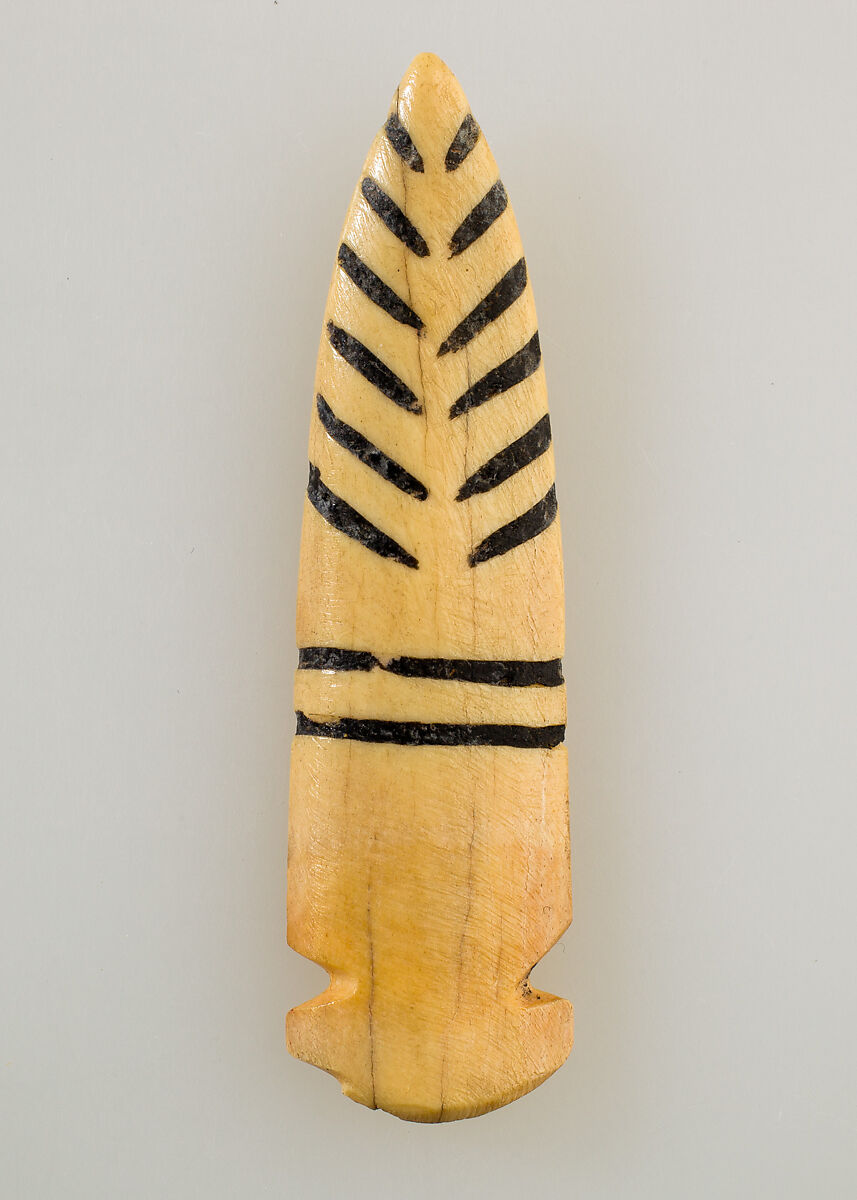 Tusk amulet, Bone 