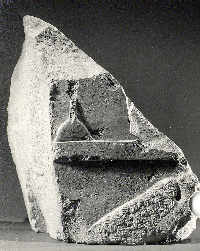 Relief fragment from a row of vulture figures, Limestone, paint