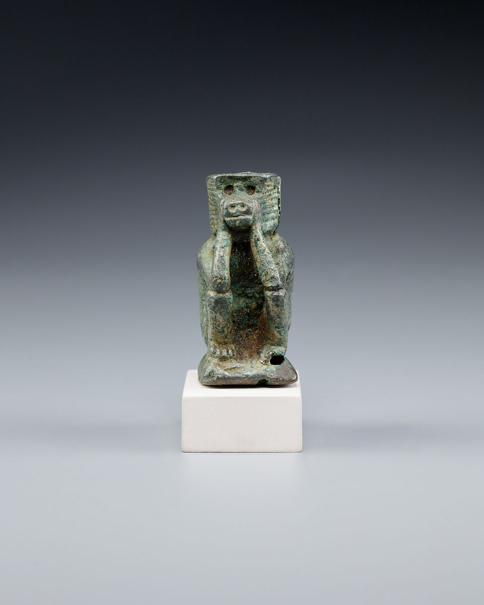 Figure of a squatting cynocephalus ape, Bronze or copper alloy
