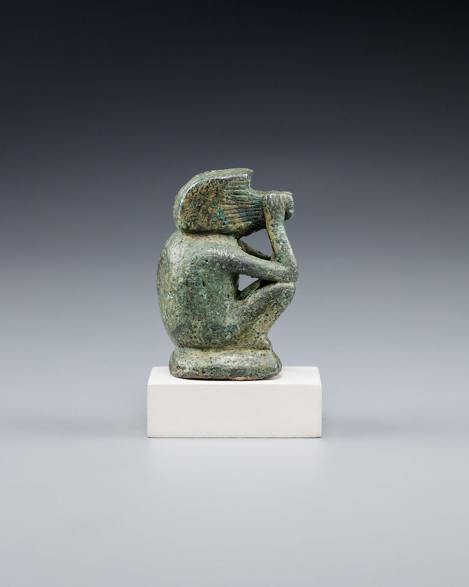 Figure of a squatting cynocephalus ape, Bronze or copper alloy