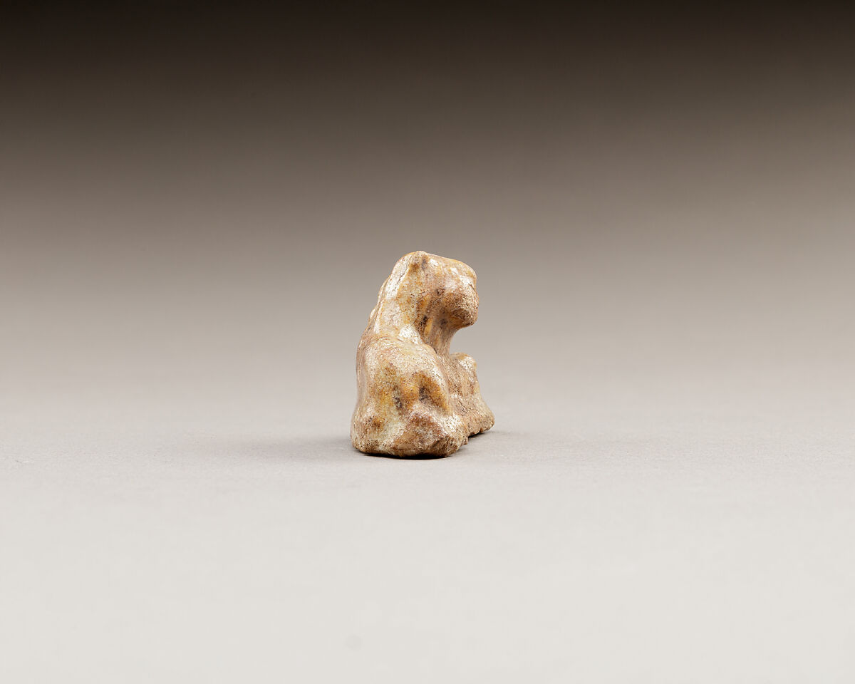 Figurine, lion, Yellow brown glazed earthenware