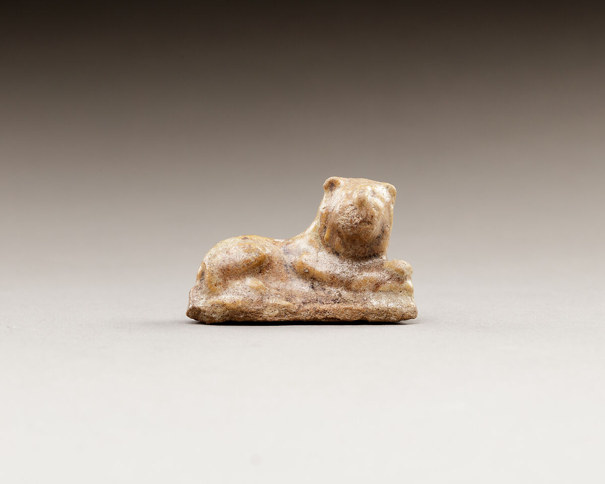 Figurine, lion, Yellow brown glazed earthenware