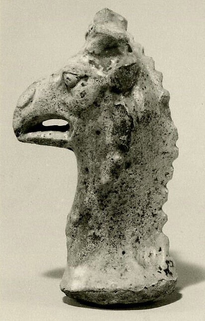 Head of a figure of a griffin, perhaps representing Nemesis, Faience