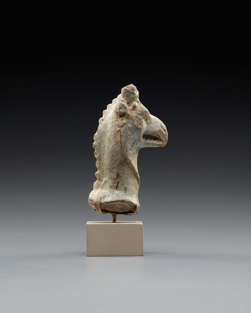 Head of a figure of a griffin, perhaps representing Nemesis, Faience