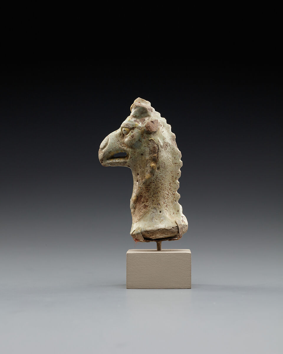 Head of a figure of a griffin, perhaps representing Nemesis, Faience
